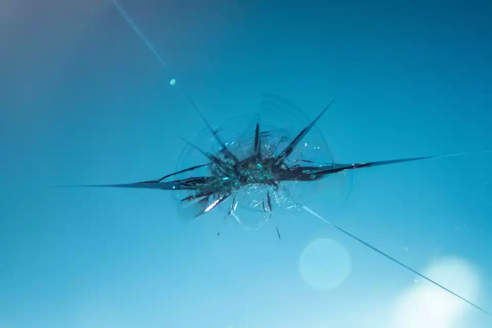 close up of a chipped windshield