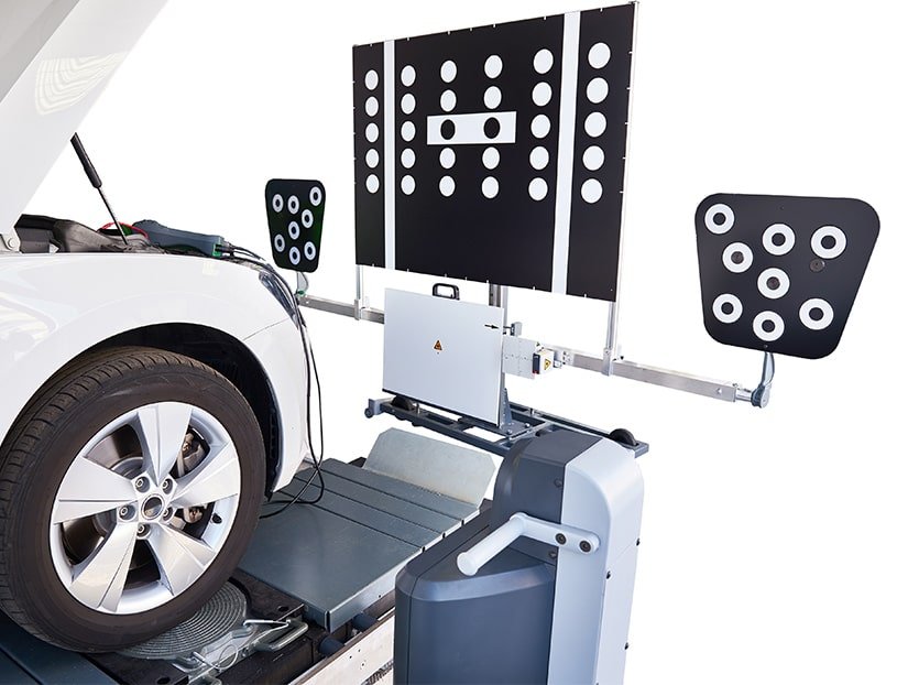 a vehicle and an adas calibration device with a chart